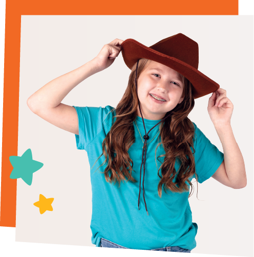 Smiling teenage girl wearing a blue shirt and cowboy hat